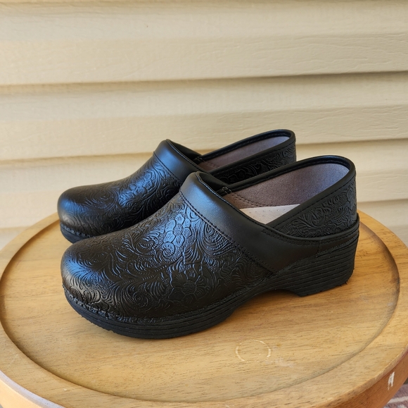 Dansko Shoes - Dansko women's black clogs size 37 floral tooled